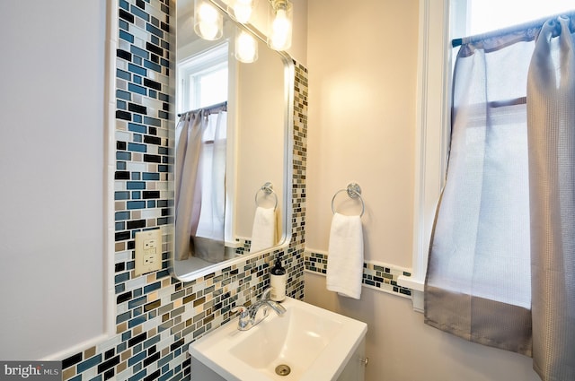 209 11th St NE, Washington, DC 20002 - bathroom featuring tasteful backsplash and vanity