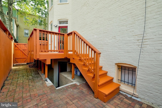 209 11th St NE, Washington, DC 20002 - wooden terrace with fence, a gate, a patio area, and stairway