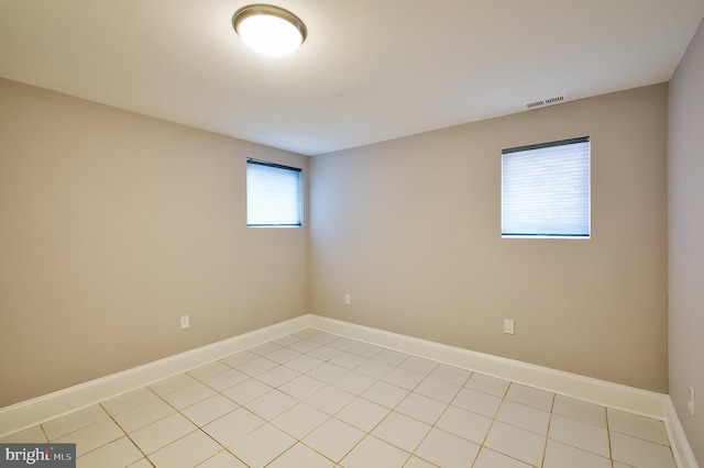 209 11th St NE, Washington, DC 20002 - unfurnished room featuring light tile patterned flooring and baseboards