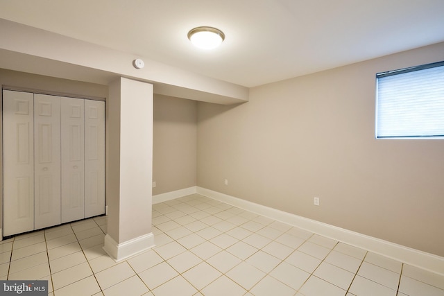 209 11th St NE, Washington, DC 20002 - basement featuring light tile patterned flooring and baseboards