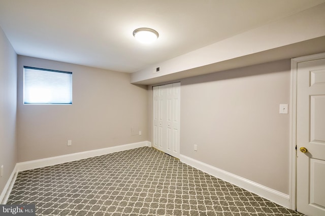 209 11th St NE, Washington, DC 20002 - basement featuring baseboards and carpet