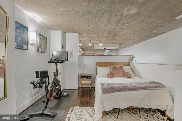929 Florida Ave NW Unit 2001, Washington, DC 20001 - bedroom with baseboards, track lighting, and wood finished floors