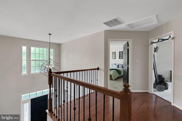 907 Whistling Duck Dr, Upper Marlboro, MD 20774 - corridor with attic access, visible vents, hardwood / wood-style flooring, baseboards, and an upstairs landing