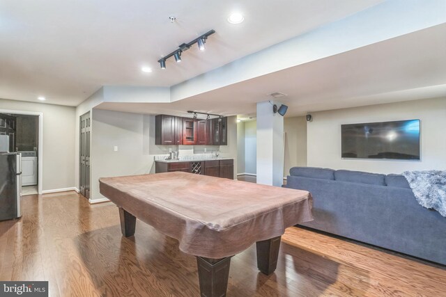 907 Whistling Duck Dr, Upper Marlboro, MD 20774 - rec room featuring track lighting, washer / clothes dryer, dark wood-style floors, billiards, and wet bar