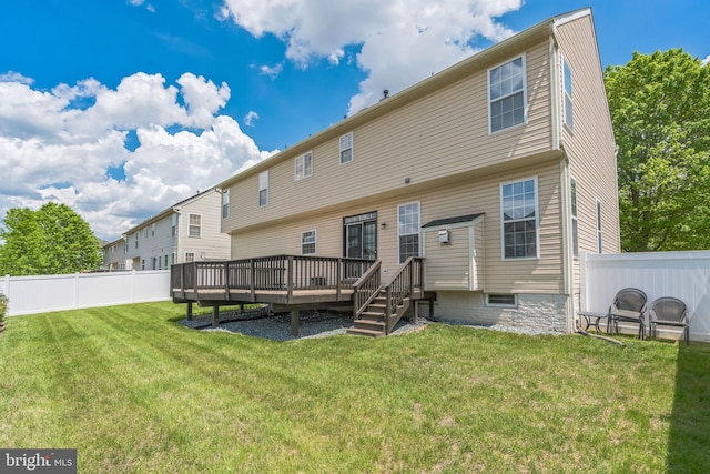 907 Whistling Duck Dr, Upper Marlboro, MD 20774 - back of property featuring a yard, a wooden deck, and fence private yard