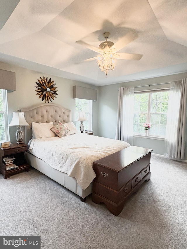 carpeted bedroom featuring a ceiling fan