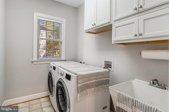 5985 Twin Branch Ct, Haymarket, VA 20169 - clothes washing area with a sink, baseboards, cabinet space, and washer and clothes dryer
