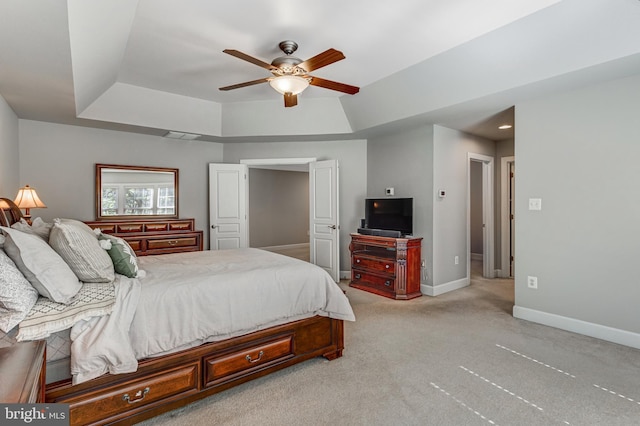 5985 Twin Branch Ct, Haymarket, VA 20169 - bedroom featuring ceiling fan, light colored carpet, baseboards, a tray ceiling, and visible vents