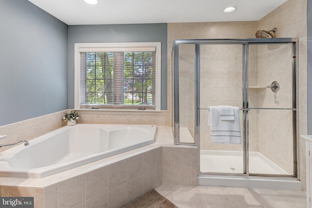 5985 Twin Branch Ct, Haymarket, VA 20169 - full bath featuring tile patterned flooring, a stall shower, recessed lighting, and a bath