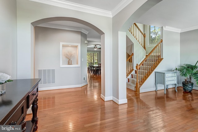 5985 Twin Branch Ct, Haymarket, VA 20169 - foyer entrance with ceiling fan, visible vents, crown molding, hardwood / wood-style flooring, and baseboards