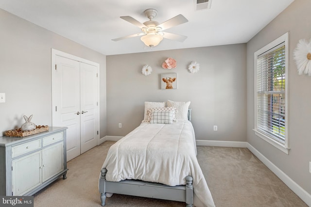 5985 Twin Branch Ct, Haymarket, VA 20169 - bedroom with baseboards, light carpet, and visible vents