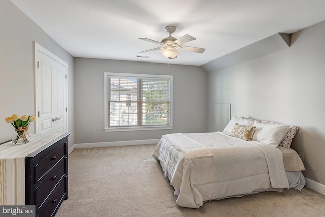 5985 Twin Branch Ct, Haymarket, VA 20169 - bedroom with baseboards, ceiling fan, visible vents, and light colored carpet