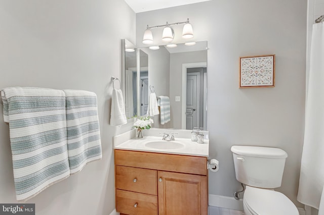 5985 Twin Branch Ct, Haymarket, VA 20169 - bathroom featuring vanity, baseboards, tile patterned floors, and toilet