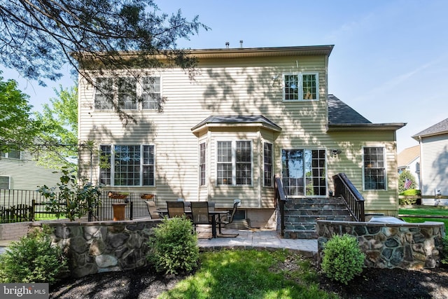 5985 Twin Branch Ct, Haymarket, VA 20169 - rear view of property with a patio and fence