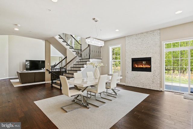 2204 Messina Ct, Eldersburg, MD 21784 - dining space featuring hardwood / wood-style floors, stairway, a large fireplace, recessed lighting, and baseboards