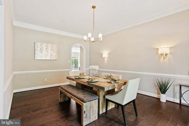 2204 Messina Ct, Eldersburg, MD 21784 - dining area with arched walkways, wood finished floors, crown molding, baseboards, and a chandelier