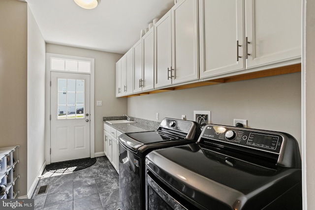 2204 Messina Ct, Eldersburg, MD 21784 - clothes washing area with independent washer and dryer, cabinet space, and baseboards