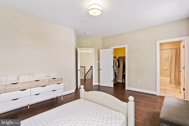2204 Messina Ct, Eldersburg, MD 21784 - bedroom with dark wood-type flooring, baseboards, a spacious closet, and a closet
