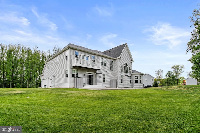2204 Messina Ct, Eldersburg, MD 21784 - rear view of property with a lawn, a patio, an attached garage, and a balcony