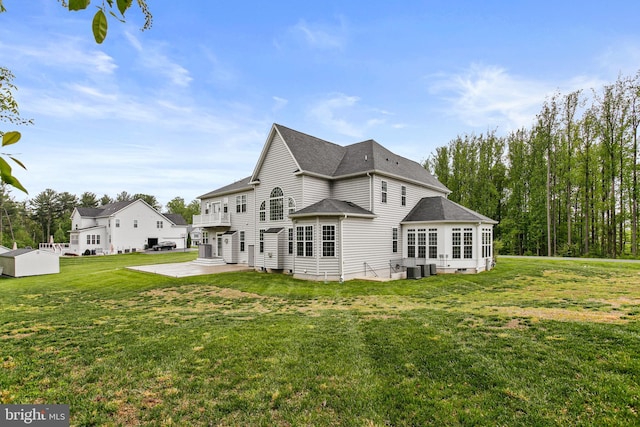 2204 Messina Ct, Eldersburg, MD 21784 - rear view of house featuring a patio, a yard, and roof with shingles