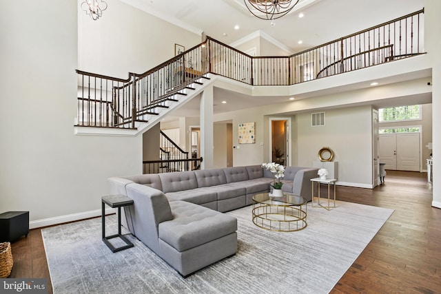 2204 Messina Ct, Eldersburg, MD 21784 - living area with stairway, a high ceiling, baseboards, recessed lighting, and wood finished floors