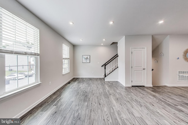 520 View Point Way, Fredericksburg, VA 22405 - unfurnished living room with stairs, wood finished floors, baseboards, and recessed lighting