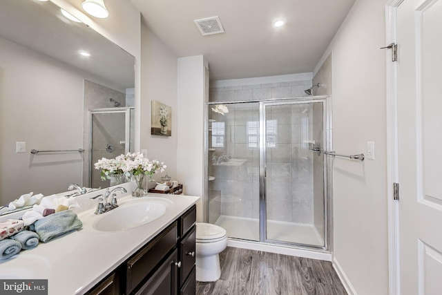 520 View Point Way, Fredericksburg, VA 22405 - full bathroom with toilet, a shower stall, vanity, wood finished floors, and recessed lighting