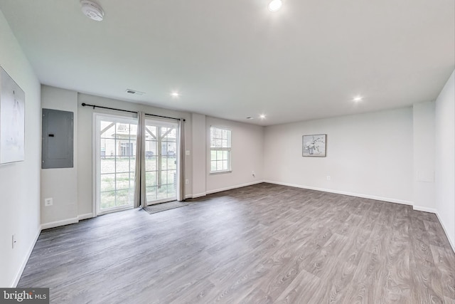 520 View Point Way, Fredericksburg, VA 22405 - unfurnished room featuring electric panel, a smoke detector, wood finished floors, baseboards, and recessed lighting