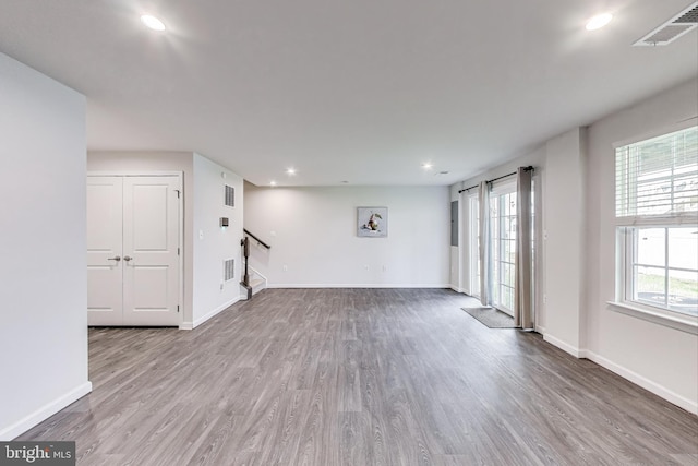 520 View Point Way, Fredericksburg, VA 22405 - unfurnished room with wood finished floors, stairs, recessed lighting, plenty of natural light, and baseboards