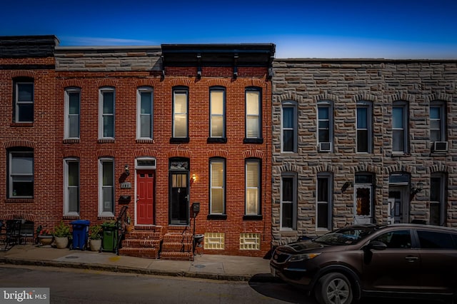 townhome / multi-family property featuring entry steps