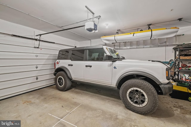 garage featuring a garage door opener