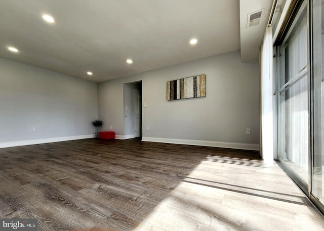 3811 Saint Barnabas Rd Unit T2, Suitland, MD 20746 - empty room featuring wood finished floors, recessed lighting, and baseboards