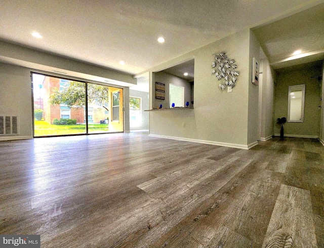3811 Saint Barnabas Rd Unit T2, Suitland, MD 20746 - unfurnished living room with wood finished floors, plenty of natural light, recessed lighting, and baseboards