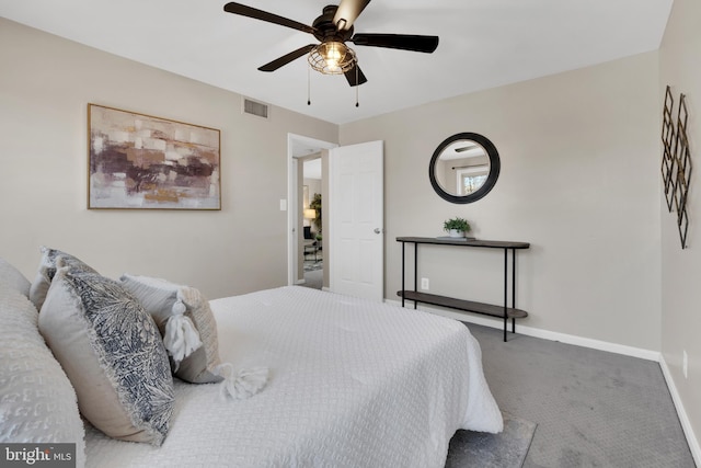 bedroom featuring carpet flooring, baseboards, visible vents, and ceiling fan