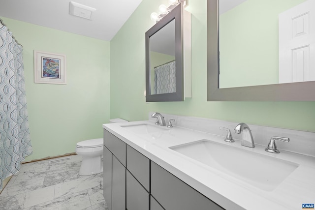 28 Begum Rd, Palmyra, VA 22963 - full bath featuring double vanity, toilet, marble finish floor, and a sink