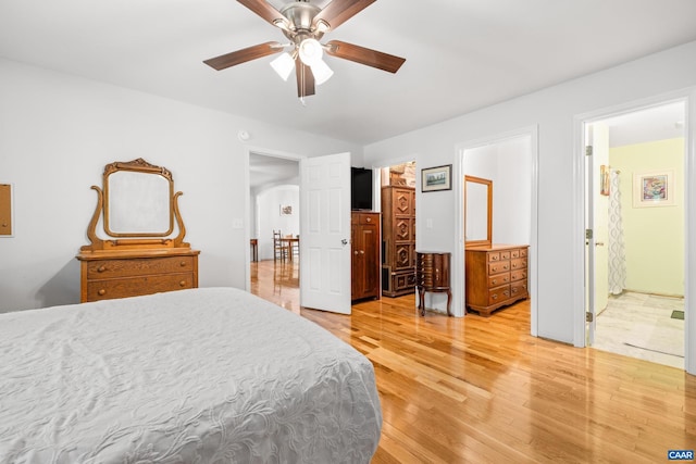 28 Begum Rd, Palmyra, VA 22963 - bedroom with arched walkways, light wood-type flooring, and a ceiling fan