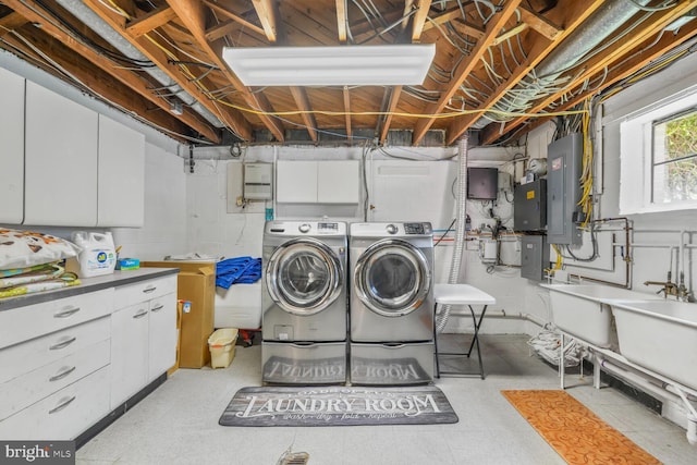 3305 Shirley Ln, Chevy Chase, MD 20815 - washroom with washing machine and clothes dryer, electric panel, tile patterned floors, and cabinet space
