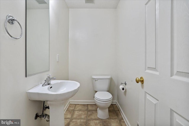 104 Seabreeze, Winchester, VA 22602 - bathroom featuring toilet and baseboards