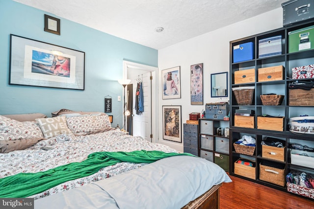 5217 Greene St, Philadelphia, PA 19144 - bedroom with a textured ceiling and wood finished floors