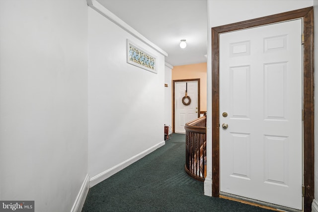 5217 Greene St, Philadelphia, PA 19144 - hallway featuring baseboards, an upstairs landing, and dark carpet