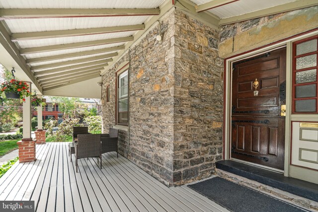 5217 Greene St, Philadelphia, PA 19144 - property entrance featuring covered porch and stone siding
