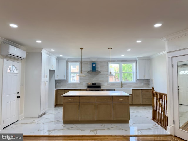 kitchen with recessed lighting, a wall unit AC, tasteful backsplash, and stainless steel range with electric stovetop
