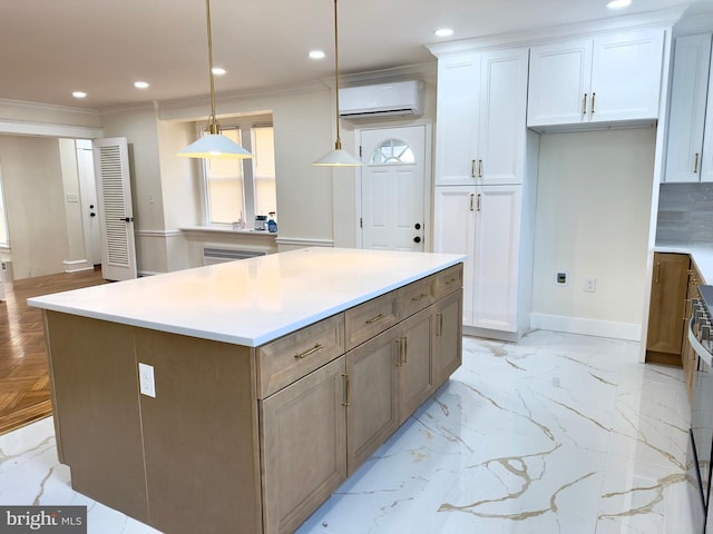 kitchen with recessed lighting, a wall mounted air conditioner, crown molding, and a center island