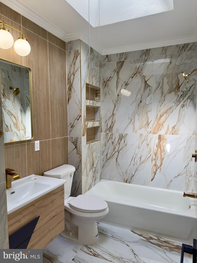 bathroom with shower / bath combination, vanity, toilet, marble finish floor, and ornamental molding