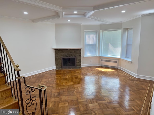 unfurnished living room with a brick fireplace, recessed lighting, and baseboards