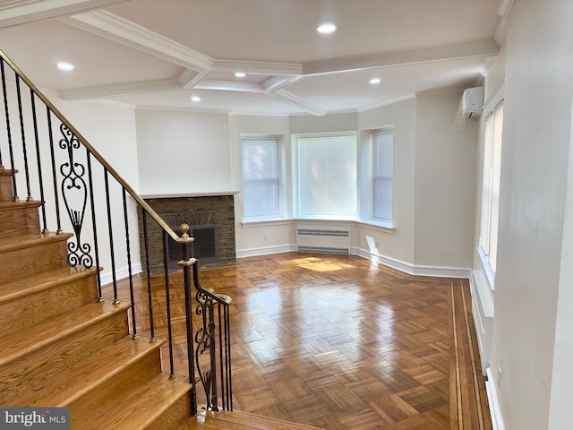 foyer entrance with stairs, baseboards, an AC wall unit, radiator heating unit, and recessed lighting
