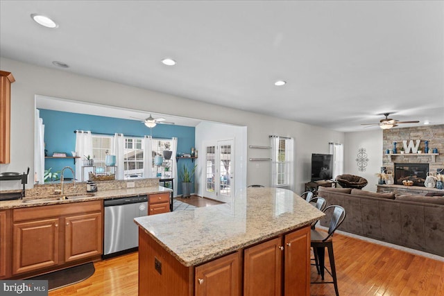 10 Warbler Ct, Stafford, VA 22554 - kitchen featuring a sink, ceiling fan, a kitchen bar, and dishwasher