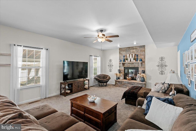 10 Warbler Ct, Stafford, VA 22554 - carpeted living area featuring plenty of natural light, baseboards, ceiling fan, and visible vents
