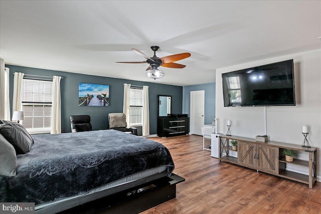 10 Warbler Ct, Stafford, VA 22554 - bedroom featuring multiple windows, a ceiling fan, and wood finished floors