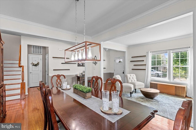 10 Warbler Ct, Stafford, VA 22554 - dining space featuring ornamental molding, stairway, and hardwood / wood-style flooring